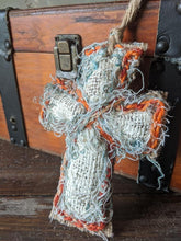 Load image into Gallery viewer, Boho Burlap Cross Ornament Rear View Mirror whimsical orange blue white stuffed Jesus God religious christian free saved faith trust love
